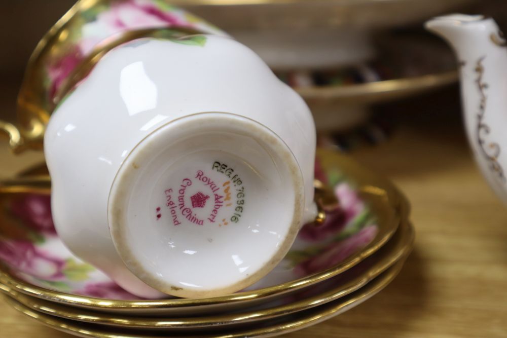 A Royal Albert Old Country Rose part tea set and a Crown Derby coffee set, two Derby comports etc.